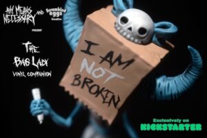Scrambled Eggs Creative Announces I Am NOT Broken The Bag Lady Vinyl Companion 8.5" Vinyl Figure Kickstarter Campaign