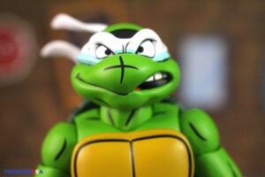 NECA Toys Teenage Mutant Ninja Turtles Adventures April as the 5th Turtle Archie Comics Figure