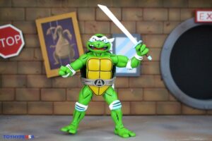 NECA Toys Teenage Mutant Ninja Turtles Adventures April as the 5th Turtle Archie Comics Figure