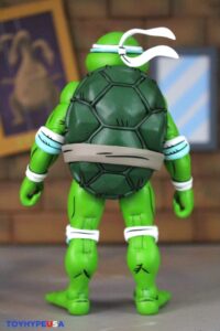 NECA Toys Teenage Mutant Ninja Turtles Adventures April as the 5th Turtle Archie Comics Figure
