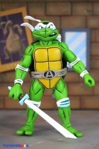 NECA Toys Teenage Mutant Ninja Turtles Adventures April as the 5th Turtle Archie Comics Figure