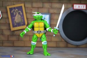 NECA Toys Teenage Mutant Ninja Turtles Adventures April as the 5th Turtle Archie Comics Figure